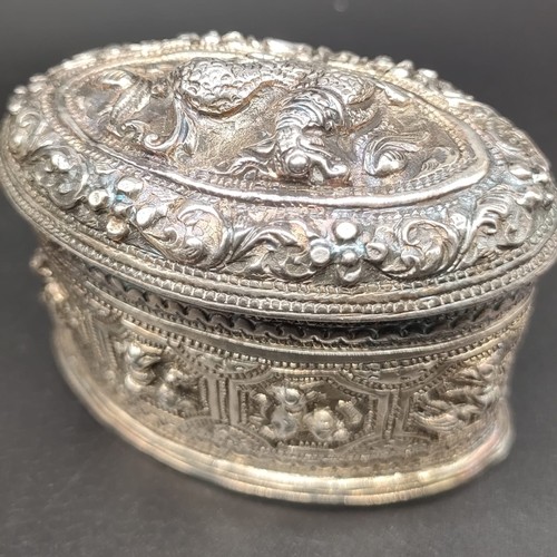 1205 - Burmese Silver Highly decorative raised relief lidded trinket dish, Silver hand and horn blade Kris ... 