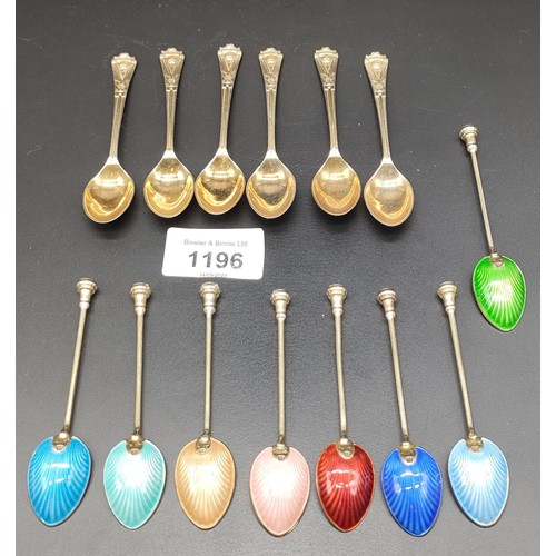 1196 - A Set of eight Birmingham silver and enamel coffee spoons with a gilt finish. Together with a set of... 