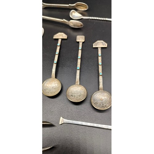 1197 - Collection of mixed silver spoons; and sugar tongs and three plated Egyptian spoons [171grams]