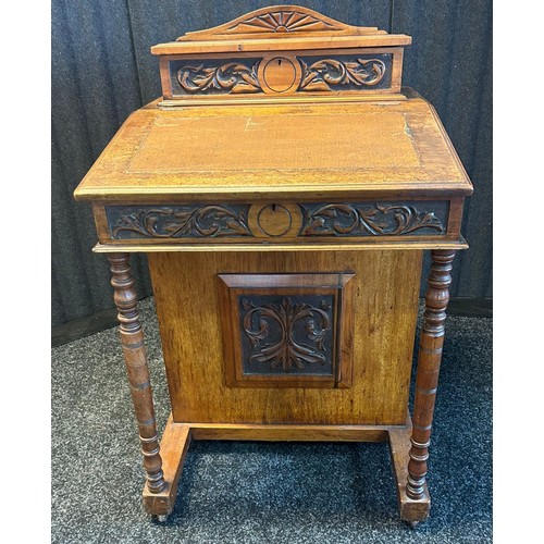 1676 - 19th century Davenport desk, the top and slope opening to interior storage, the front with turned su... 