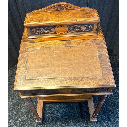 1676 - 19th century Davenport desk, the top and slope opening to interior storage, the front with turned su... 