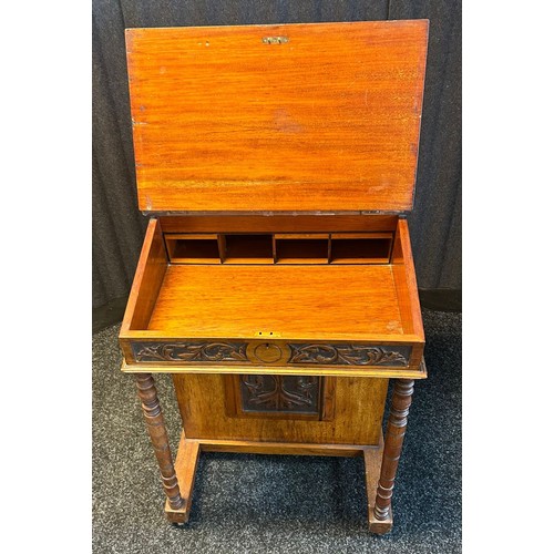 1676 - 19th century Davenport desk, the top and slope opening to interior storage, the front with turned su... 