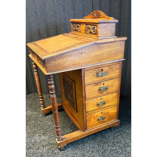 1676 - 19th century Davenport desk, the top and slope opening to interior storage, the front with turned su... 