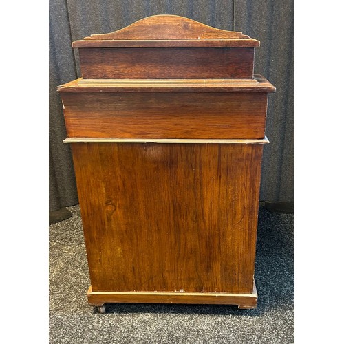 1676 - 19th century Davenport desk, the top and slope opening to interior storage, the front with turned su... 