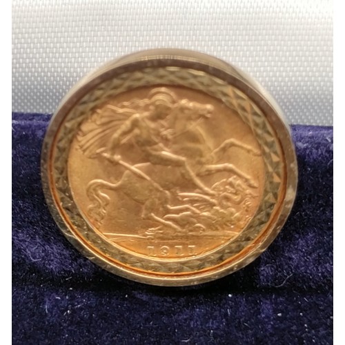 1105 - A Pair of 9ct yellow gold cuff links fitted with two King George V Half Gold Sovereigns dated 1911 &... 