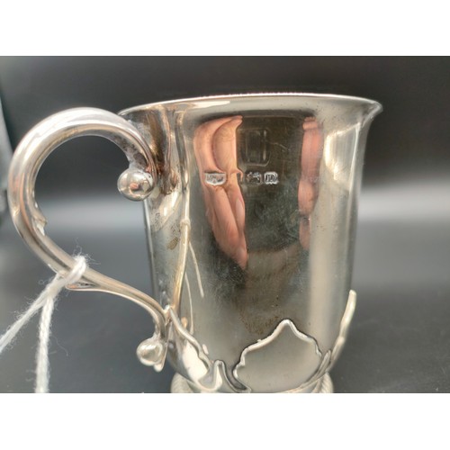 1117 - Heavy silver Mappin & Webb ornate drinking mug. [202.75grams]