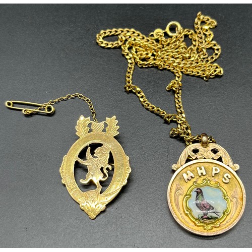 1109 - 9ct yellow gold fob medal with an enamelled pigeon designed cartouche together with a 9ct yellow gol... 