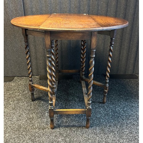 1320 - 19th century oak drop end table raised on barley twist legs [74x84x36cm