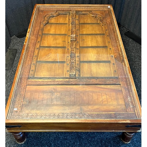 1681 - A Large Hardwood Rustic Indian Door upcycled into a lounge table. Has a fitted Glass insert top. [41... 