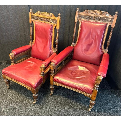 1349 - A pair of 19th century Oak his and her oak arm chairs, carved top sections, leading to turned column... 