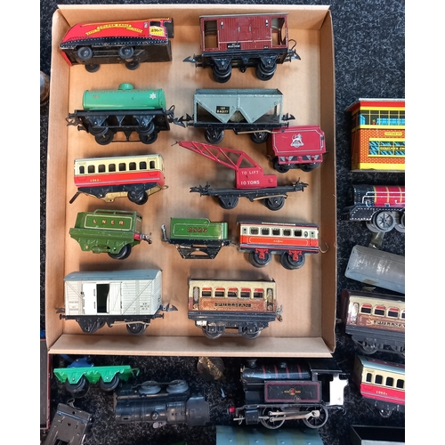 1685 - A Selection of Clockwork Trains and carriages,  Loco's, carriages, signals, turntable, buffers and t... 