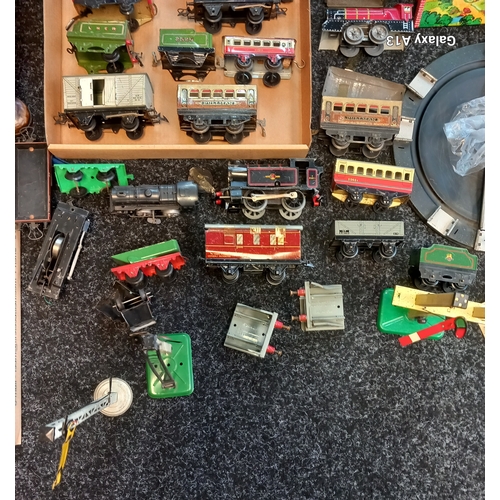 1685 - A Selection of Clockwork Trains and carriages,  Loco's, carriages, signals, turntable, buffers and t... 