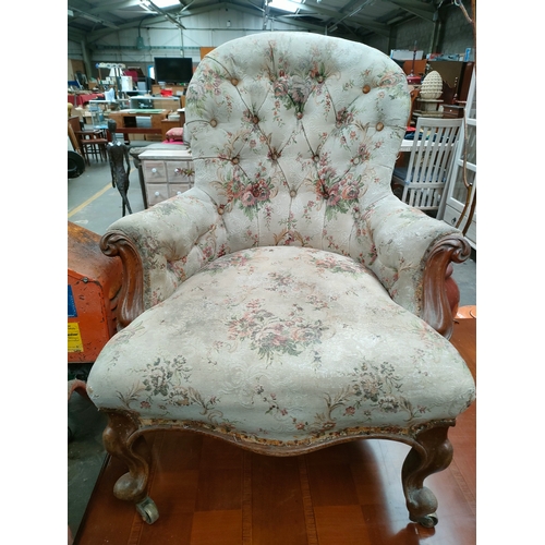 1006B - A Victorian button arm chair