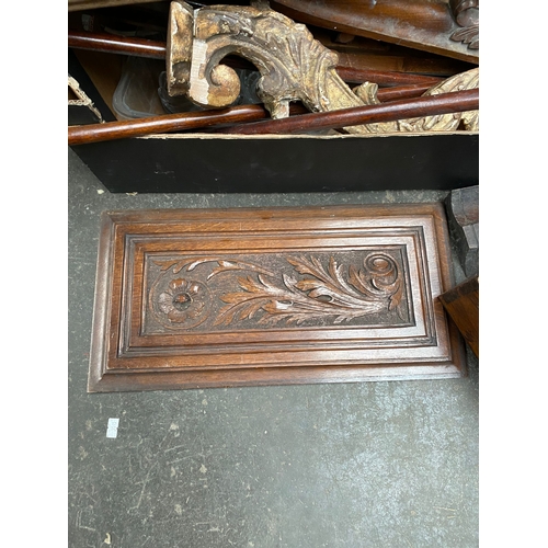 1005A - A selection of antique furniture restoration items includes ornate wood legs