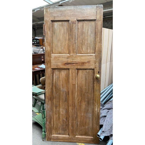 1011B - An antique stripped 4 panel door