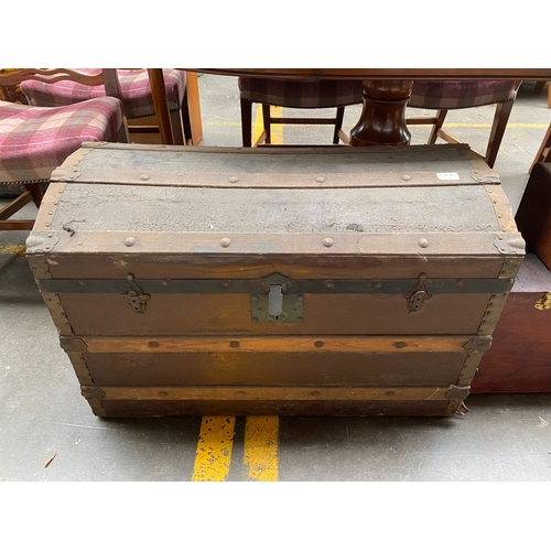 879A - A vintage dome Saratoga trunk along with 2 vintage boxes includes shoe polish style box