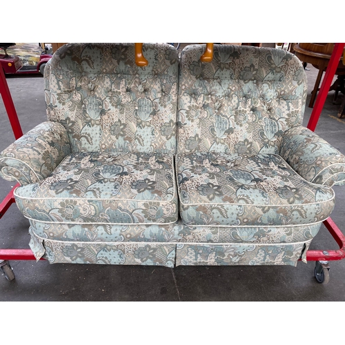 64C - A three piece cottage suite includes gulwing arm chairs