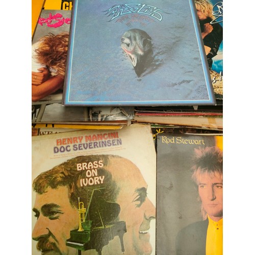 64E - A collection of records to include David Bowie, rod Stewart, Shirley bassie and Paul McCartney