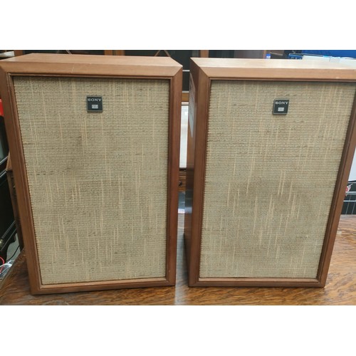 64F - A pair of teak Sony mid century speakers