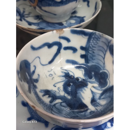 1229 - Selection of Antique Chinese blue and white dragon design cups and saucers, matching bowl, one other... 