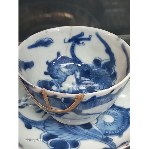 1229 - Selection of Antique Chinese blue and white dragon design cups and saucers, matching bowl, one other... 