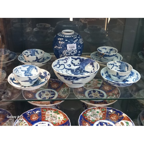 1229 - Selection of Antique Chinese blue and white dragon design cups and saucers, matching bowl, one other... 