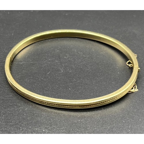 123 - 9ct yellow gold bangle [5.63grams]