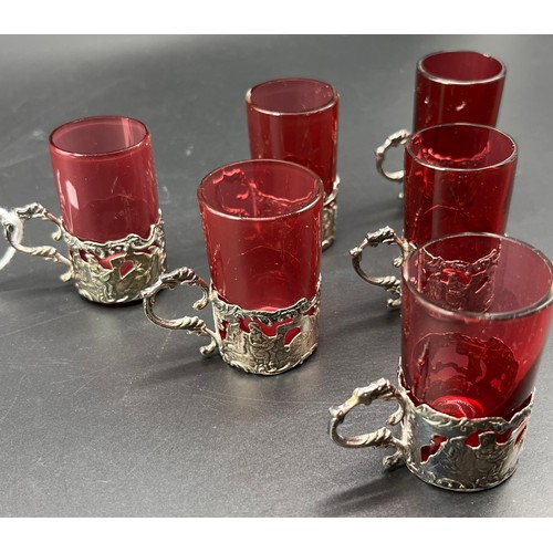 103A - A Set of Six London silver and cranberry glass drinking glasses.