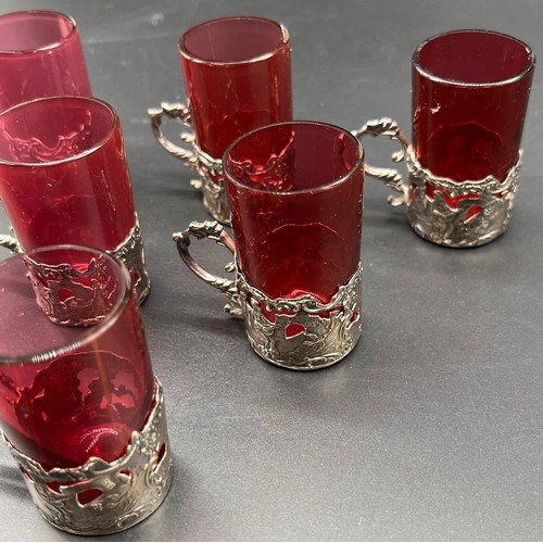 103A - A Set of Six London silver and cranberry glass drinking glasses.