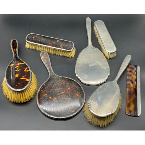 33 - Four Birmingham silver art deco design hand brushes and hand mirror. Together with Three Birmingham ... 