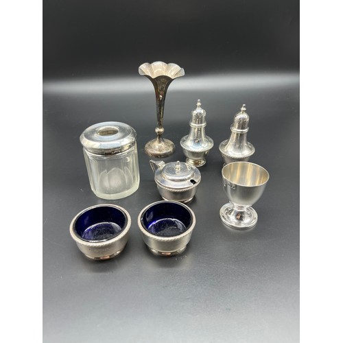 46 - Various silver items; a pair of Birmingham silver pepper pots, London silver egg cup, Three Birmingh... 