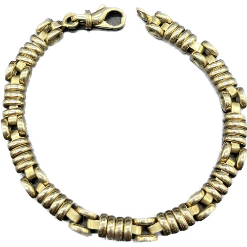 77 - 9ct yellow gold unusual linked bracelet. [31.26grams]