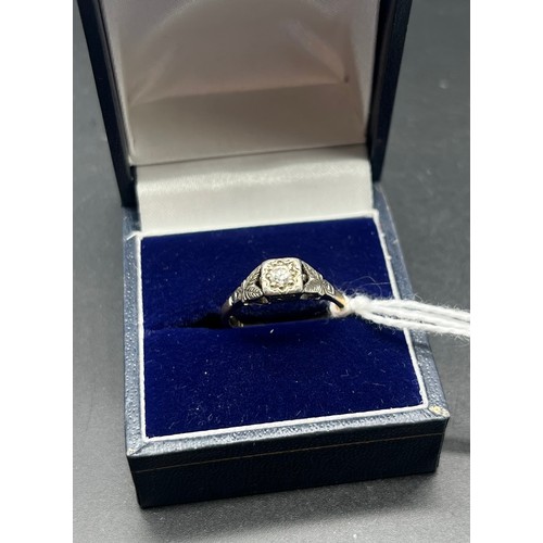 25 - 18ct and platinum diamond ring. [Ring size L] [2.78Grams]