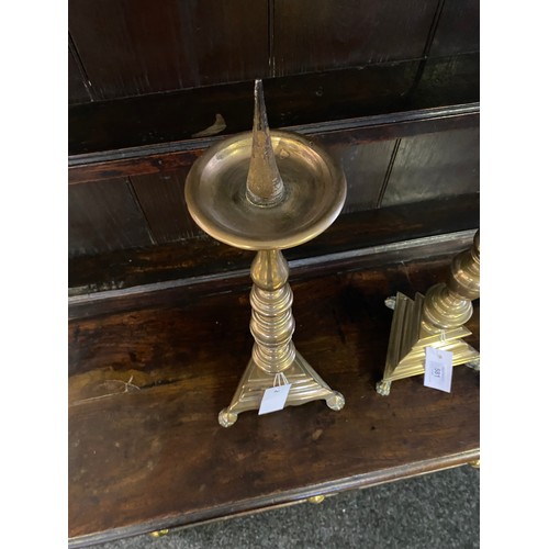 Near pair of Brass Pricket Candlesticks, 18th century with dished drip pans  on turned baluster stems