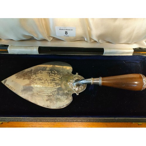 8 - Glasgow silver and walnut handled presentation trowel. Comes with box. [30cm in length] [224grams]