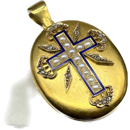 6 - 14ct/15ct yellow gold Victorian locket; Designed with a cross show casing pearls, blue enamel trim a... 