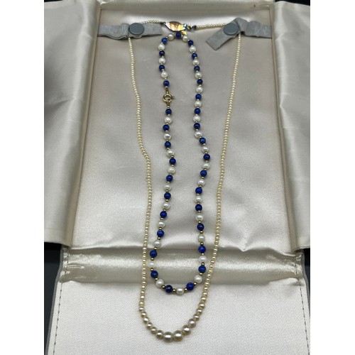 70 - 18ct yellow gold and natural pearl necklace- a single row graduating necklace of 239 pearls. comes w... 