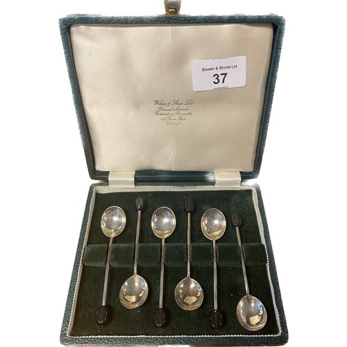 37 - Two boxed sets of six Birmingham and Sheffield silver coffee bean spoons.