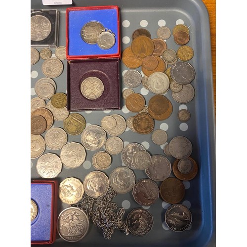 56 - A Tray of mixed world coins; 1889 Silver crown within a silver pendant holder, 1879 American One Dol... 