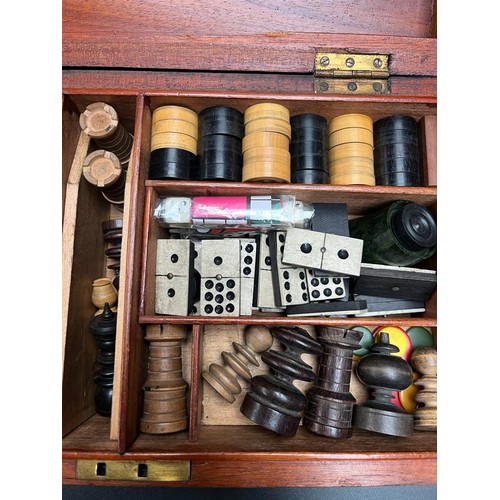 665 - Antique mahogany games box containing The Steeple Chase board game and chess set and various other i... 