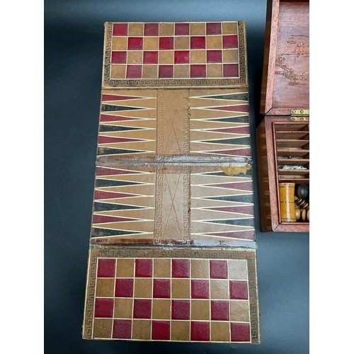 665 - Antique mahogany games box containing The Steeple Chase board game and chess set and various other i... 