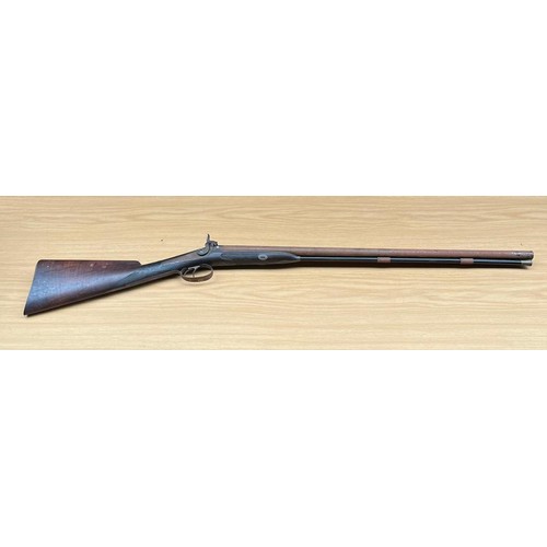 669 - 19th century cap rifle. Engraved to top and metal work- see images. Mahogany wood and steel. Comes w... 