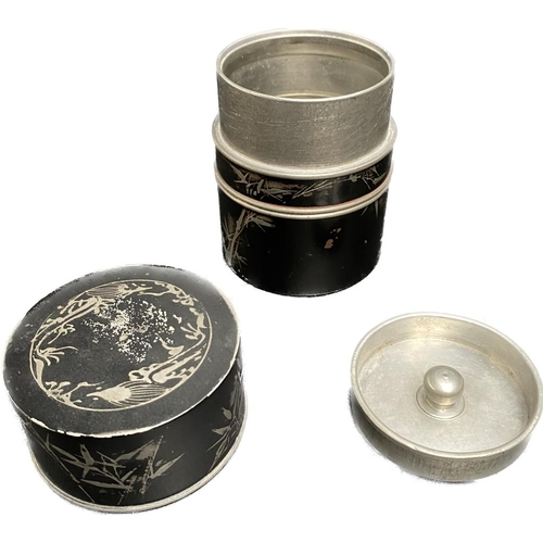 9 - A Chinese silvered and black enamelled spice caddy with character signature to base.