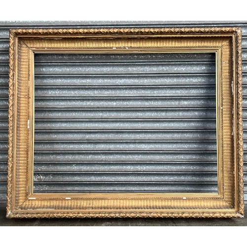 309W - Large 19th century ornate moulded gilt frame. [142x115cm]