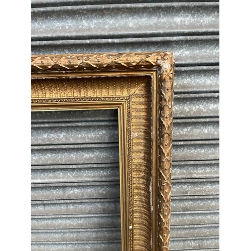 309W - Large 19th century ornate moulded gilt frame. [142x115cm]