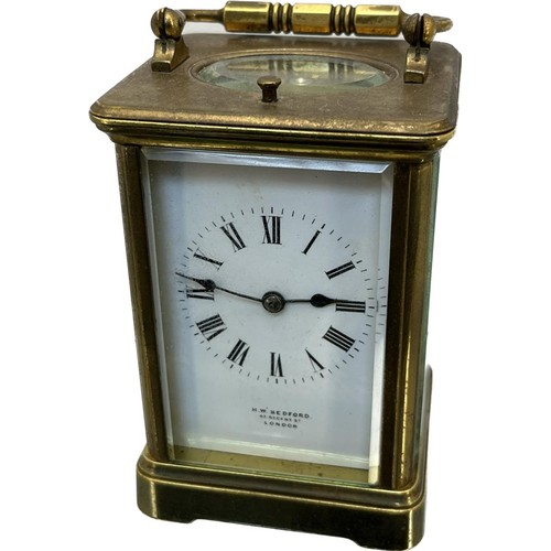 566 - Antique Brass and bevel glass carriage clock; H.W. Bedford London- Double barrel movement - in a run... 