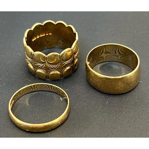 574 - Three 9ct yellow gold band rings. [12.61grams]