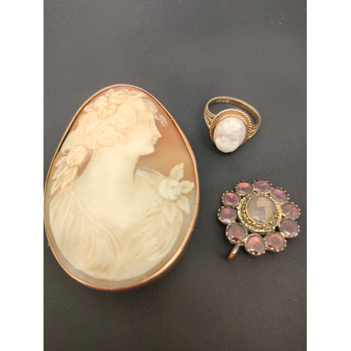 22 - 9ct yellow gold and cameo carved ring. A large Victorian gilt metal and carved cameo brooch. Togethe... 