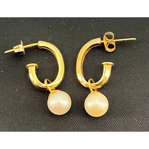65 - A Pair of 14ct yellow gold and pearl drop earrings. [3.91grams]