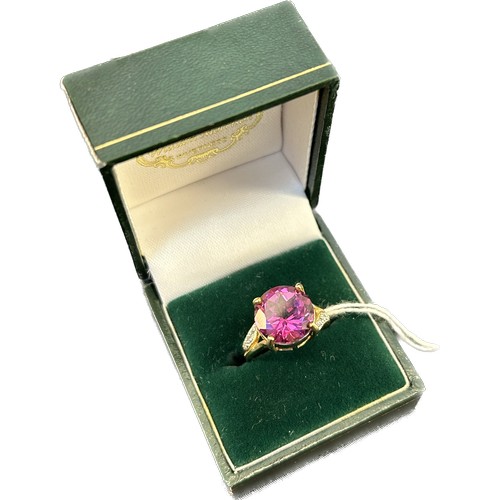 1 - 9ct yellow gold ladies ring set with a round cut pink spinel stone [Ring size N] [5.98grams]